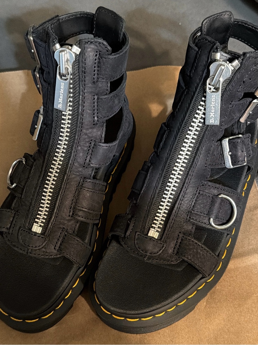 Dr. Martens Black Leather Women’s Zip Gladiator Sandals with Yellow Stitching